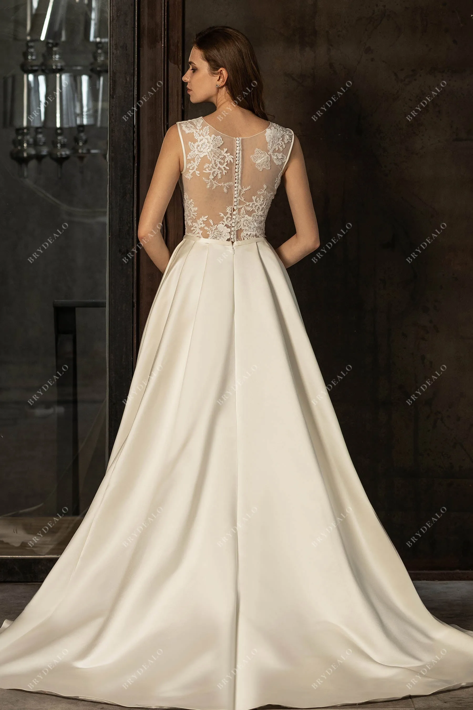 Elegant Pearl Satin A-line Bridal Gown with Lace Details